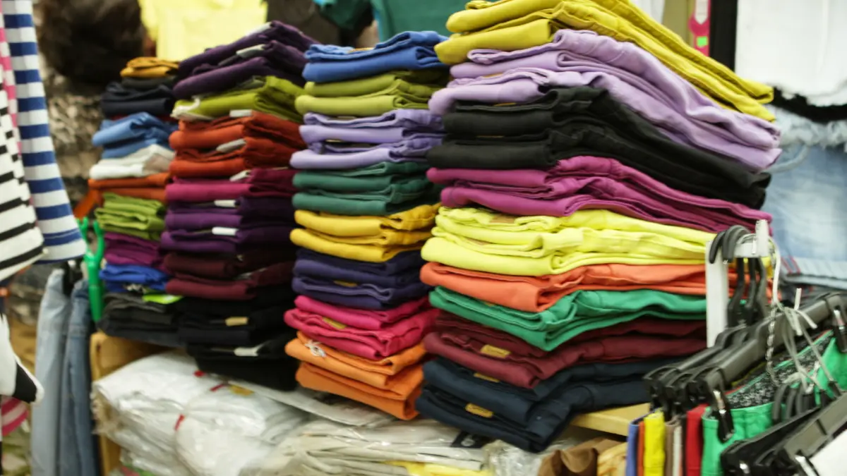 Stacks of clothes and scarves for sale at Saigon Square, Ho Chi Minh City