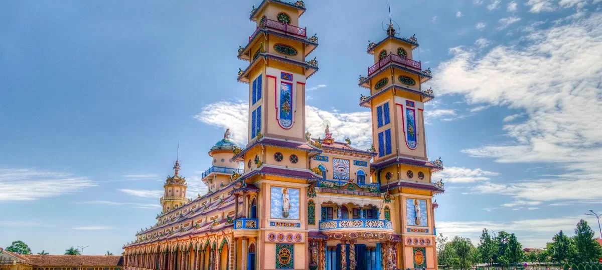 Cao Dai Holy See in Tay Ninh with its twin towers and colourful facade