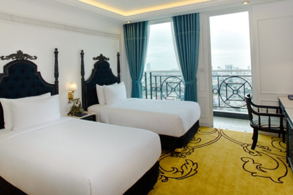 Room with two beds at Fivitel Da Nang