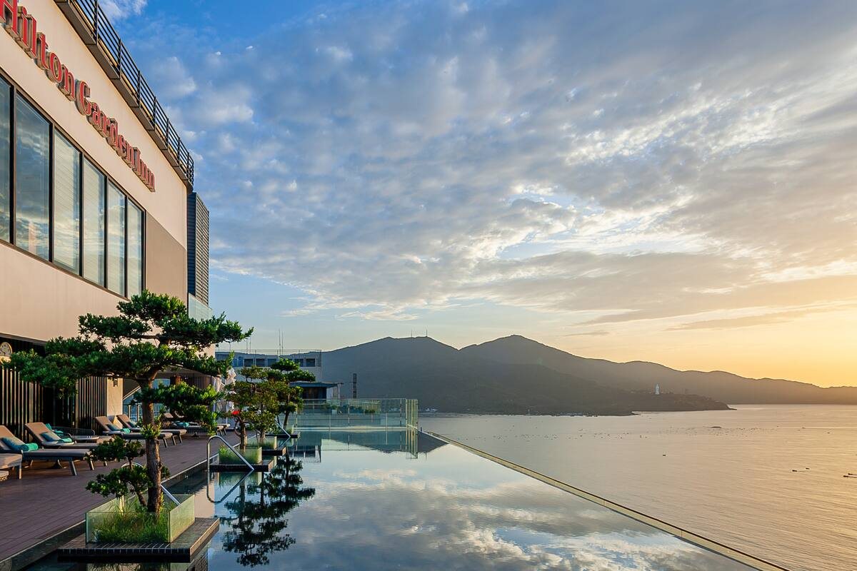 Rooftop pool at sunrise at Hilton Garden Inn Da Nang