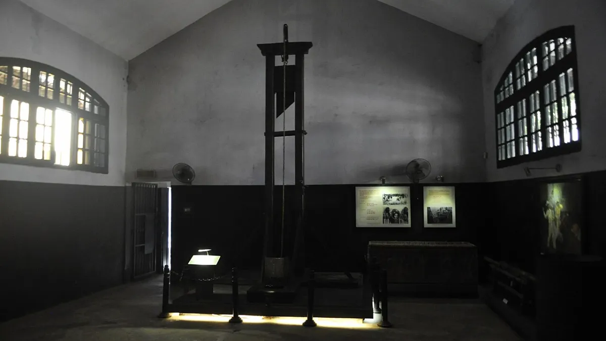 Guillotine chopping block displayed at Hoa Lo Prison, Hanoi