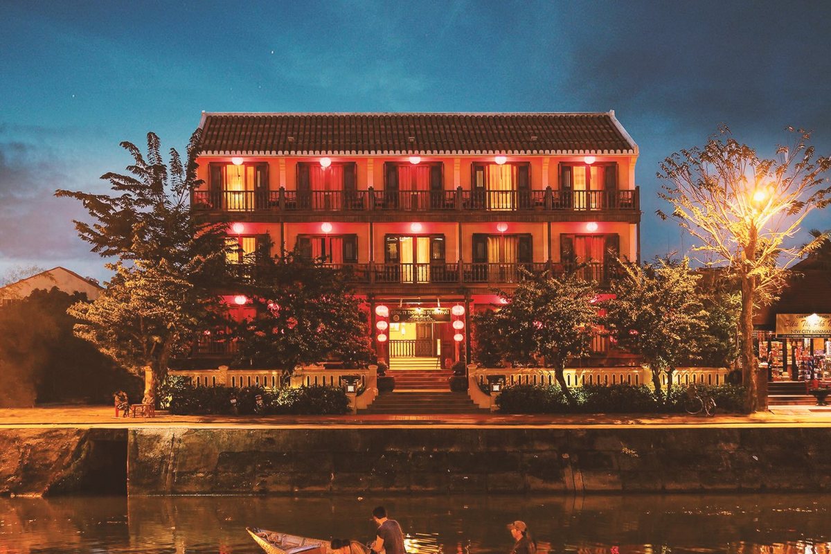Little Hoi An hotel facade lit up at night