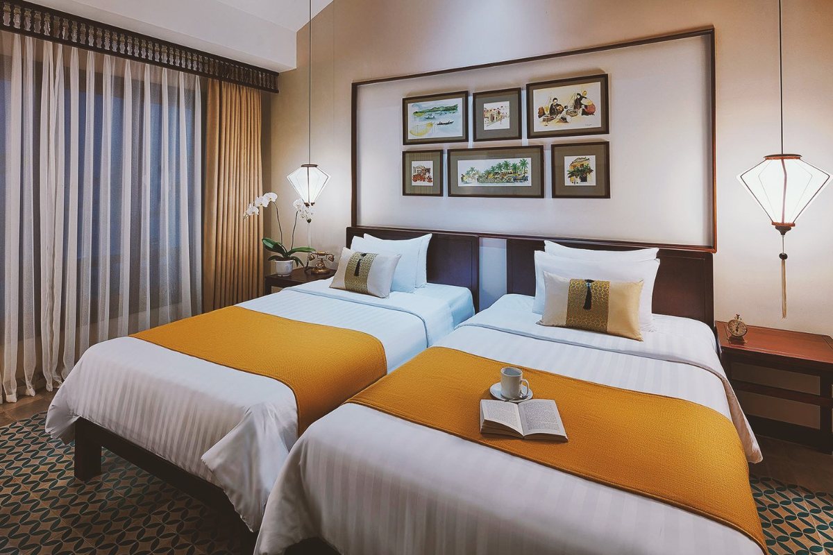 Little Deluxe room with two beds at Little Hoi An