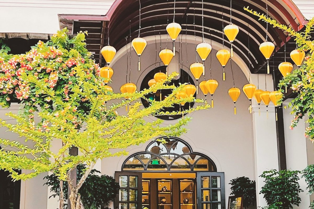 Lantern-lit garden entrance of Little Residence Hoi An