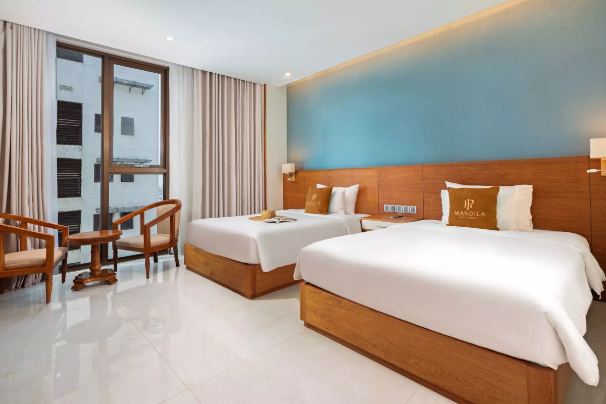 Deluxe Twin room with a partial sea view at Mandila Beach Hotel