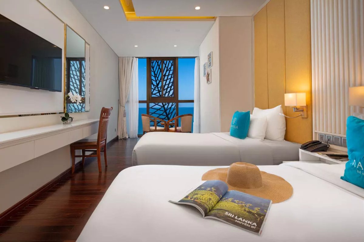 Bedroom of the Mandila Family Apartment at Mandila Beach Hotel