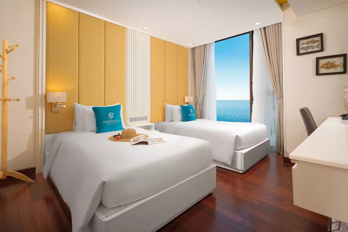 Bedroom of the Junior Family Apartment at Mandila Beach Hotel