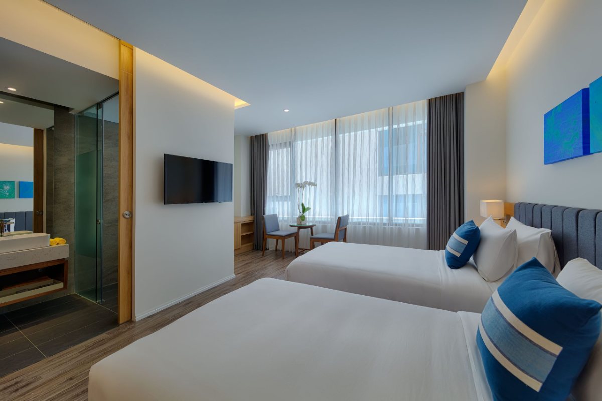 Deluxe room with window at Parosand Danang Hotel