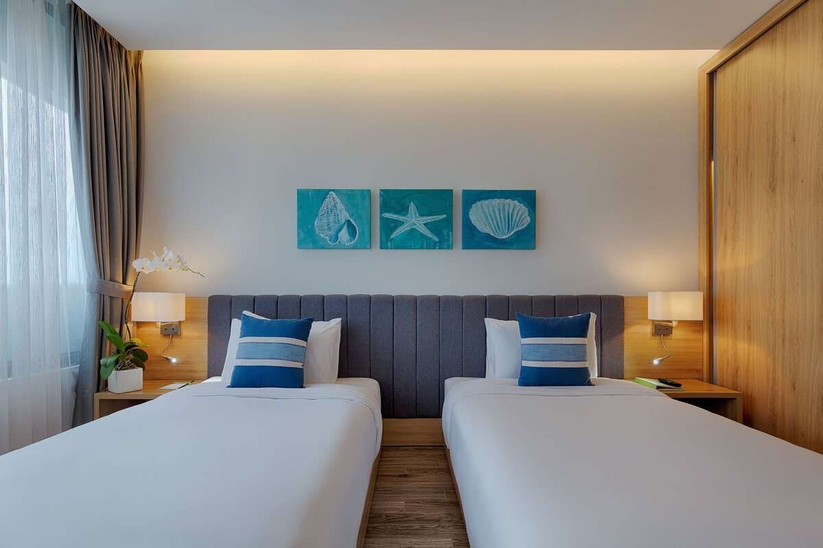 Senior Deluxe room with a partial sea view at Parosand Danang Hotel