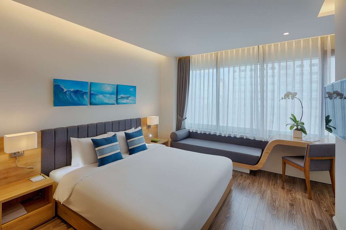 Senior Deluxe room with two beds at Parosand Danang Hotel