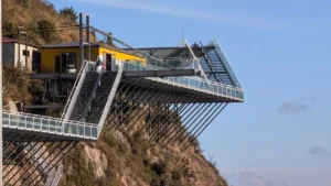Rong May Glass Bridge skywalk jutting out from the cliff on O Quy Ho Pass near Sapa