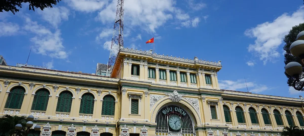 Yellow French colonial facade of Saigon Central Post Office in Ho Chi Minh City