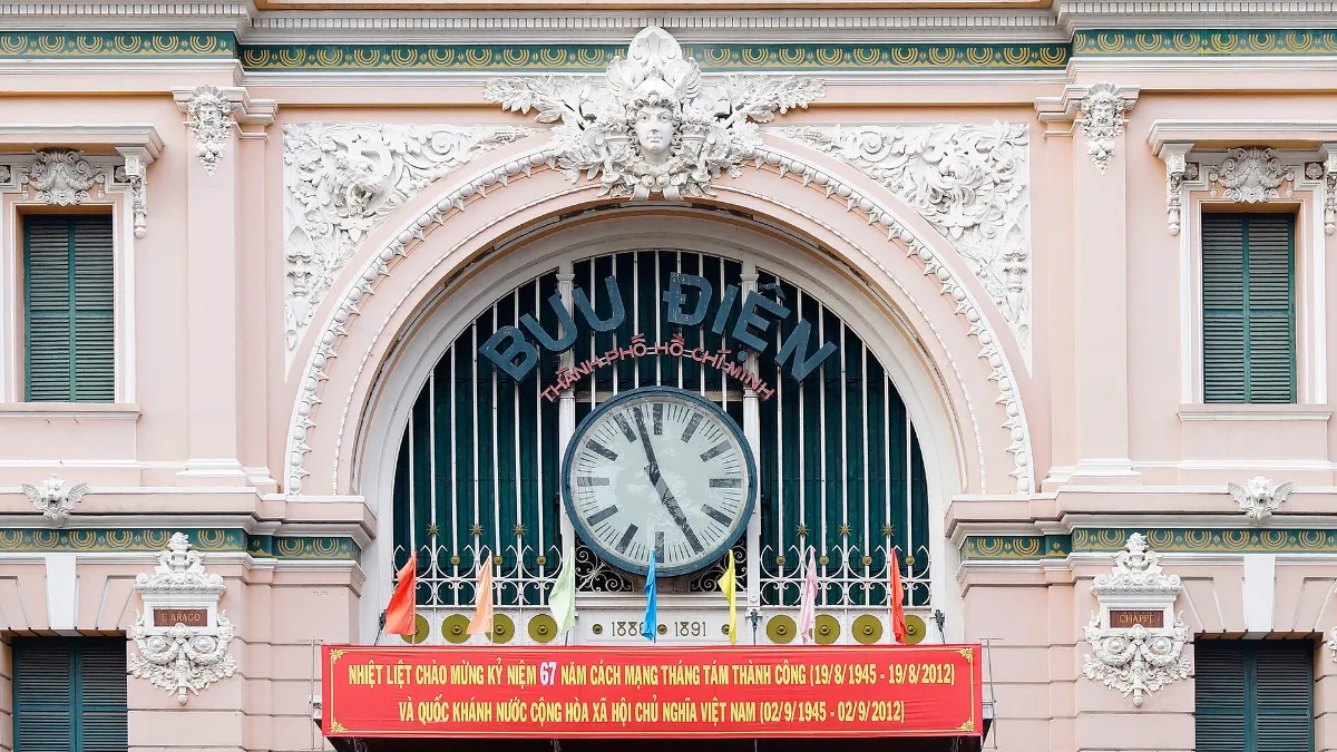 Clock above the entrance of Saigon Central Post Office