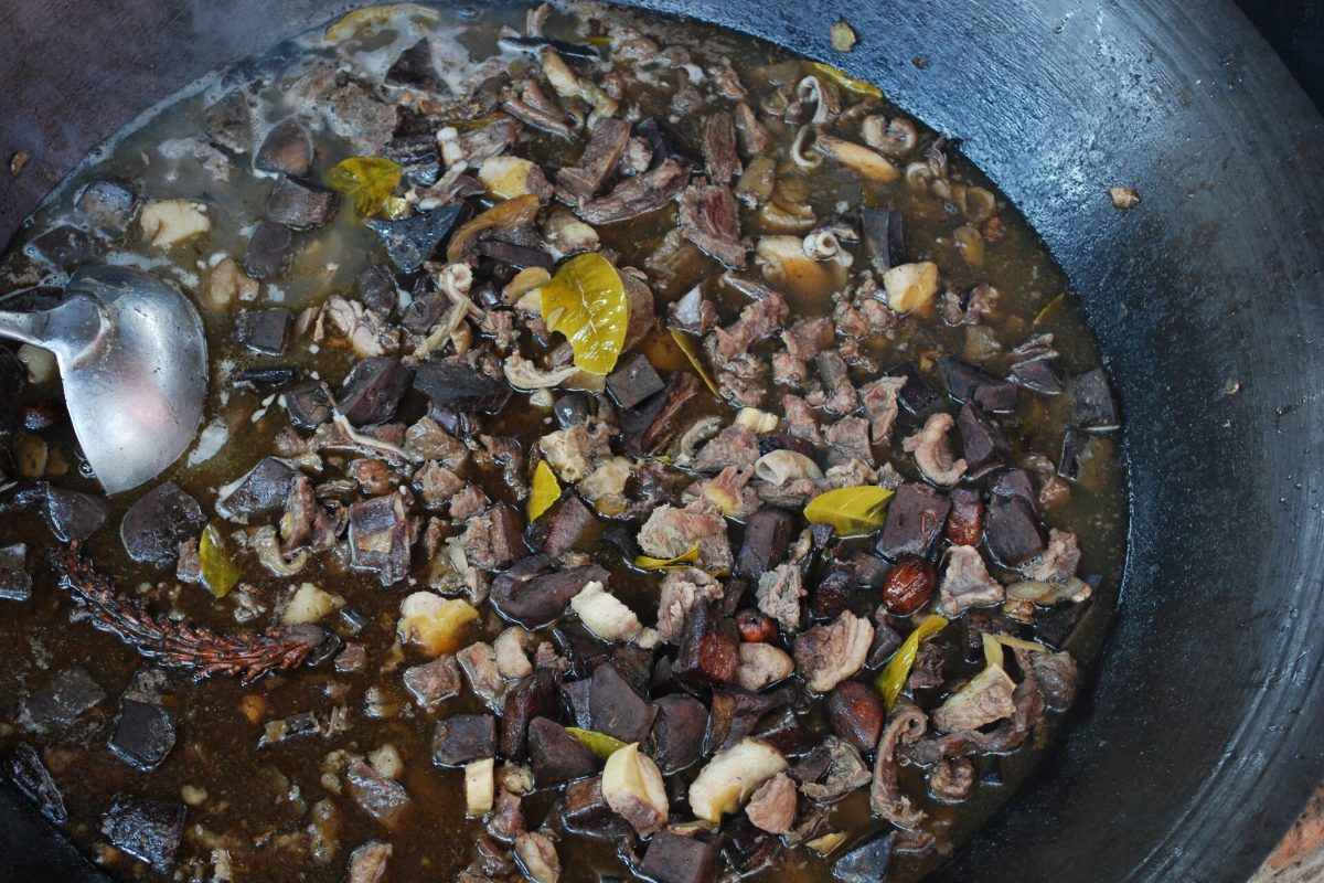 Thang co, the offal stew of the northern Vietnamese highlands, simmering in a large pan