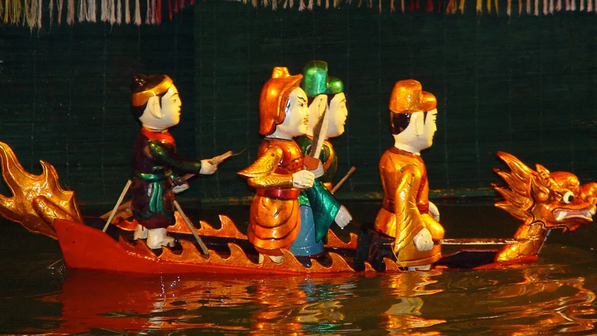 Water puppets in a boat scene at a water puppet show